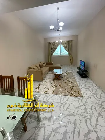 Luxury apartment, second occupancy, one bedroom, living room with open balcony. Ajman, Al Rashidiya 3. Fully furnished for monthly rent.