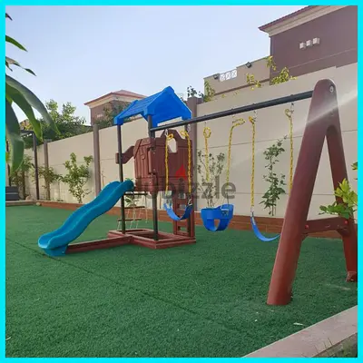 TREEHOUSE WITH SWINGS AND SLIDES