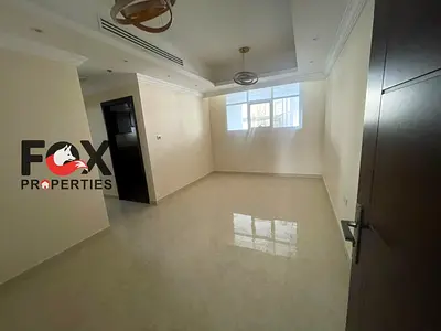 1BR for annual rent in Al Rawda 2, Ajman, second tenant. 2 bathrooms, free parking. AED 30,000/year, 6 payments, security deposit by cheque.