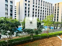 Spacious luxurious lush studio apartment with balcony Kitchen appliances pool view ready to move