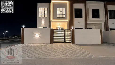Villa for sale in Al Zahia, Ajman, featuring 4 master bedrooms, a majlis, a living room, and a maid's room. Freehold ownership available for all natio