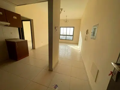 شقة غرفة نوم واحدة + غرفة دراسة | برج بارادايس ليك B6 | مدينة الإمارات عجمان | موقف سيارات