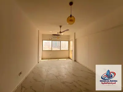 A beautiful 3-bedroom apartment with a living room and 2 balconies in Al Majaz. It features "super deluxe" finishes and an excellent layout suitable f