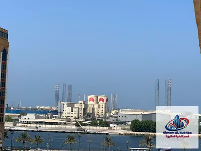 Panoramic views and a practical design at Al Majara! A studio featuring a separate kitchen and built-in wardrobes, offering a distinctive view that cr