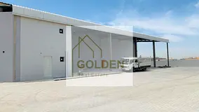 Warehouse for Rent in Umm Al Quwain with a total area of 7,500 sq ft, including an open shed with th