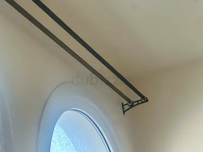 Ceiling-mounted double curtain rods (black 2 and gold 2) - good condition