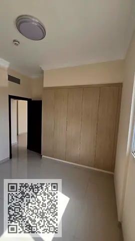Apartment with one bedroom, a living room, two bathrooms, a balcony, and built-in wardrobes; second-time occupancy; located in Al Jurf 3, near Sheikh