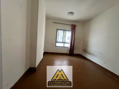 1BR for annual rent in Al Rashidiya 1, Ajman. Spacious, balcony, 1 bath, central AC, and free maintenance by the ow