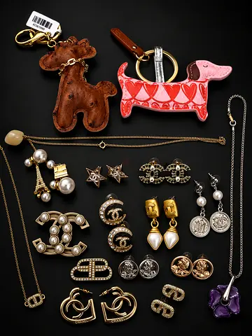Assorted designer-style jewelry keychains lot of necklaces, earrings, brooches each for AED 15