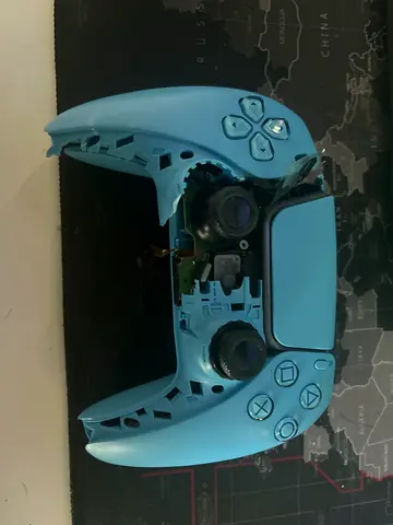 Broken light blue PS5 DualSense controller - for parts/repair