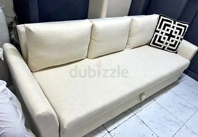 Cream Fabric 3 Seater Sofa Bed with Pillows