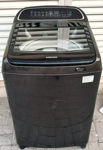 Fullu automatic Samsung 12.5kg topload washing machine, gray color, condition good working.