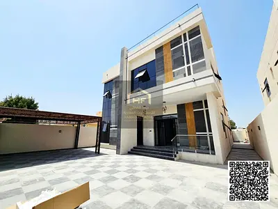 Villa for sale in Al Rawda: Two floors plus a roof terrace; freehold ownership. Price includes air conditioning and is negotiable.
