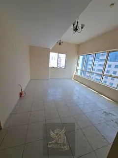 Apartment for Rent in Al Taawun, Sharjah A spacious three-bedroom apartment with a living room is av