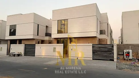 An exceptional ownership opportunity: a luxurious, modern villa with 5 master bedrooms in Al Helio 2—registration and ownership fees included! If you