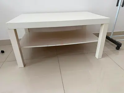 White rectangular coffee table with lower shelf - good condition
