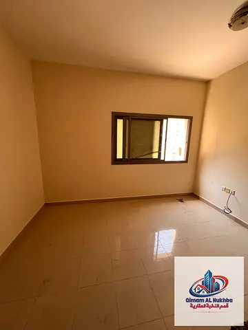 Spacious studio, 2nd tenant in Um Al Tarafa, Sharjah for AED 15,999. Free maintenance, prime location near Nesto & easy exit to Dubai.