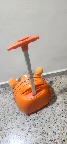 Kids orange Lion face suitcase trolley