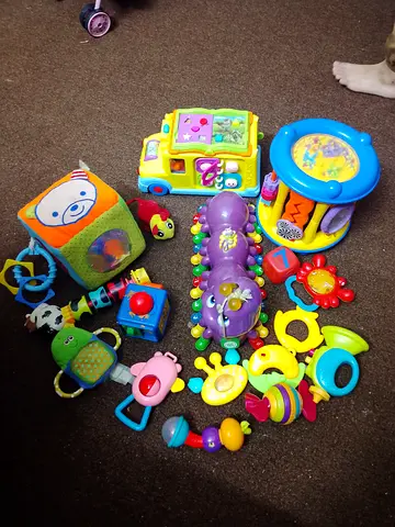 Mixed set of baby rattles, teethers and activity toys - gently used