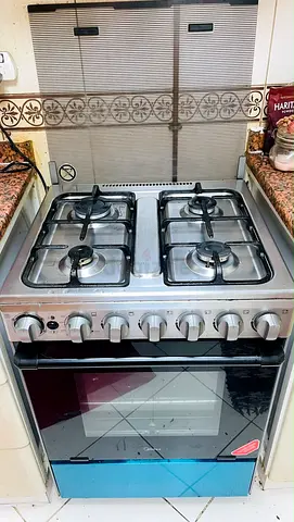 Used 4-Burner Gas Cooker with Oven - Good Working Condition