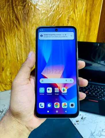 Lightly used Xiaomi smartphone with punch-hole display - good condition