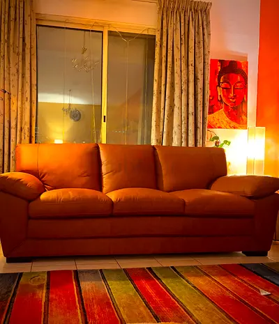 Genuine leather 3-seater sofa in tan - good condition brand new 2 months old from home centre..flawl