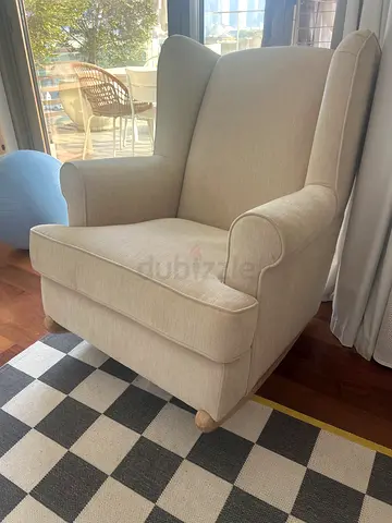 Beige Wingback rocking and feeding chair in Good Condition