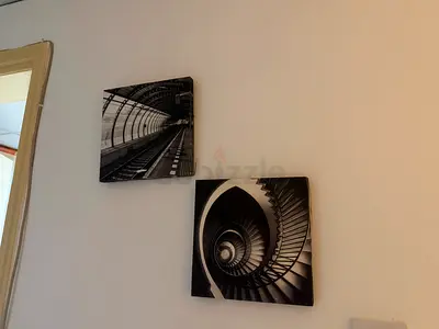 Pair of black & white spiral staircase wall art prints (set of 2)