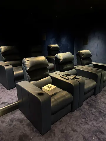 “Home Theater Electric Recliner Seats. Cinema-style recliners with cup holders and reclining buttons