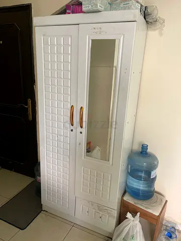 White freestanding wardrobe with mirror and storage - good condition