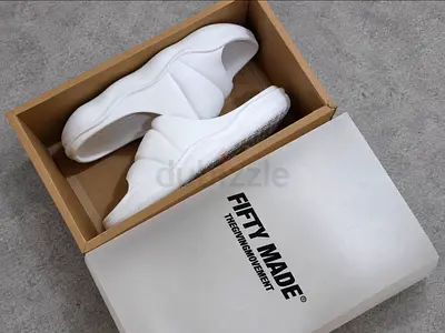 Fifty Made White Slides – The Giving Movement | EU 46 / US 12.5