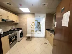 For annual rent in Al Waha Tower 1: a furnished studio. Excellent location in Al Rashidiya 1, close