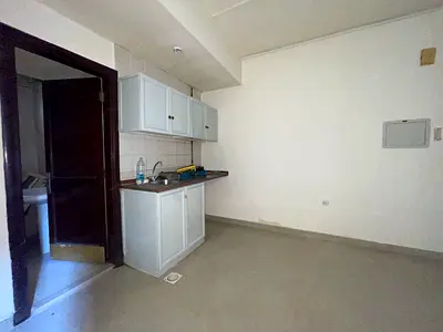 Spacious studio flat available split ac central gas family building with land free parking