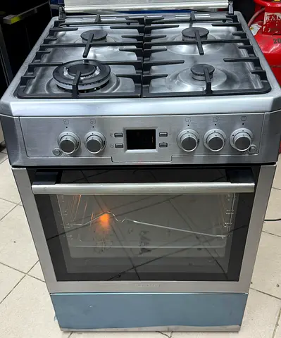 Stainless Steel 4-Burner Gas Cooker with Oven - Good Working Condition