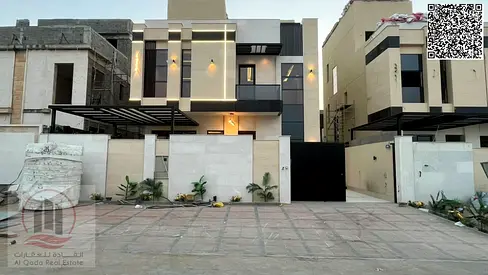 Villa for sale in Al Helio, Ajman: 5 master bedrooms, majlis, living room & maid’s room. Freehold, bank financing, registration fees included.