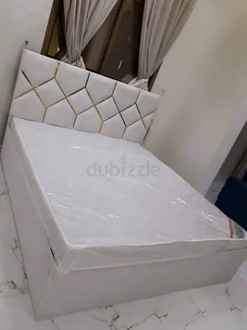 White upholstered double bed with storage - like new