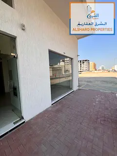 Spacious Commercial Shop for Rent in Al Jurf 3 with Two Connected Units and Suitable for Various Bus
