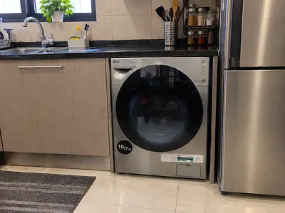 LG 10 kg washer and 7 kg dryer 2 in one new model slightly used