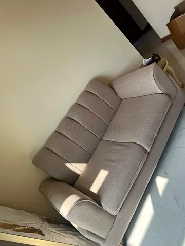 Light beige 3-seater fabric sofa in good condition