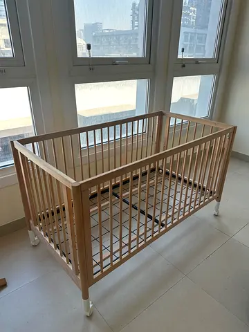 Wooden Baby Cot / Crib adjustable in excellent Condition