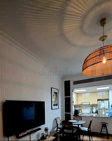 Living room pendant rattan lamp with warm ambient lighting