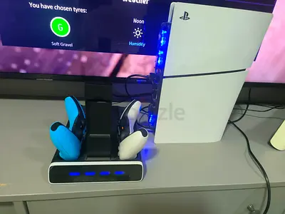 PlayStation 5 with DualSense controllers and charging dock with lots of games (Good condition)