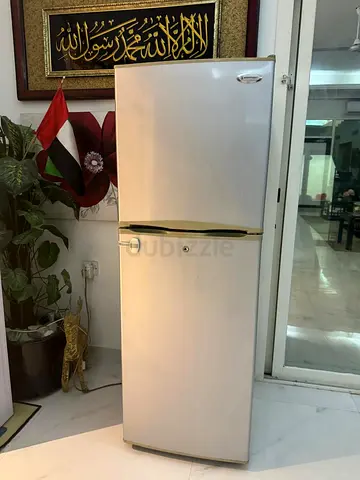 Used Silver Top-Freezer Refrigerator - Good Working Condition