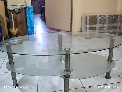Modern Oval Glass Coffee Table with Tiered Shelf