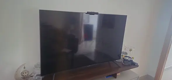 Samsung 58-inch 4K UHD Smart TV for sale in good working condition.