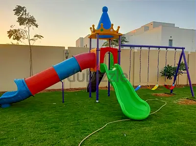 TUNNEL SLIDE WITH SWINGS