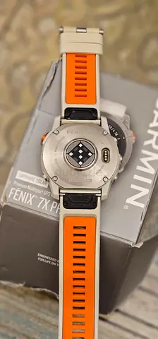 Garmin Fenix 7X Solar - Used, good condition (orange strap)
