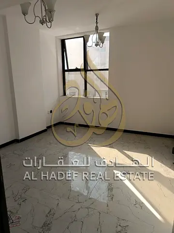 Muwaileh: One-bedroom apartment with a living room—first-time occupancy. Features central A/C and central gas, with an open view and excellent natural