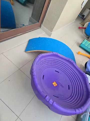 Outdoor kids play equipment sensory rock and spin, balance board