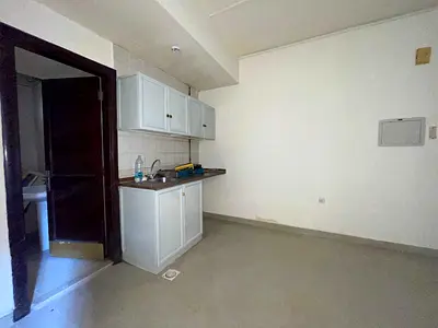Spacious studio flat available split ac central gas family building with land free parking